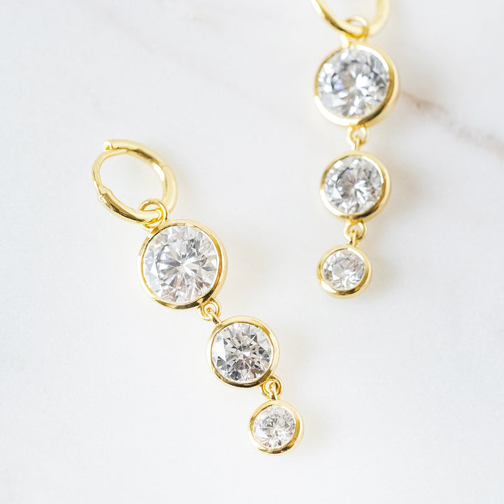 Mini Dropping Circles Huggie Hoop Earrings in Cubic Zirconia