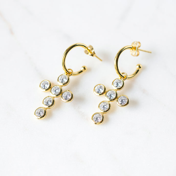 Cross Charm Huggie Hoop Earrings in Cubic Zirconia