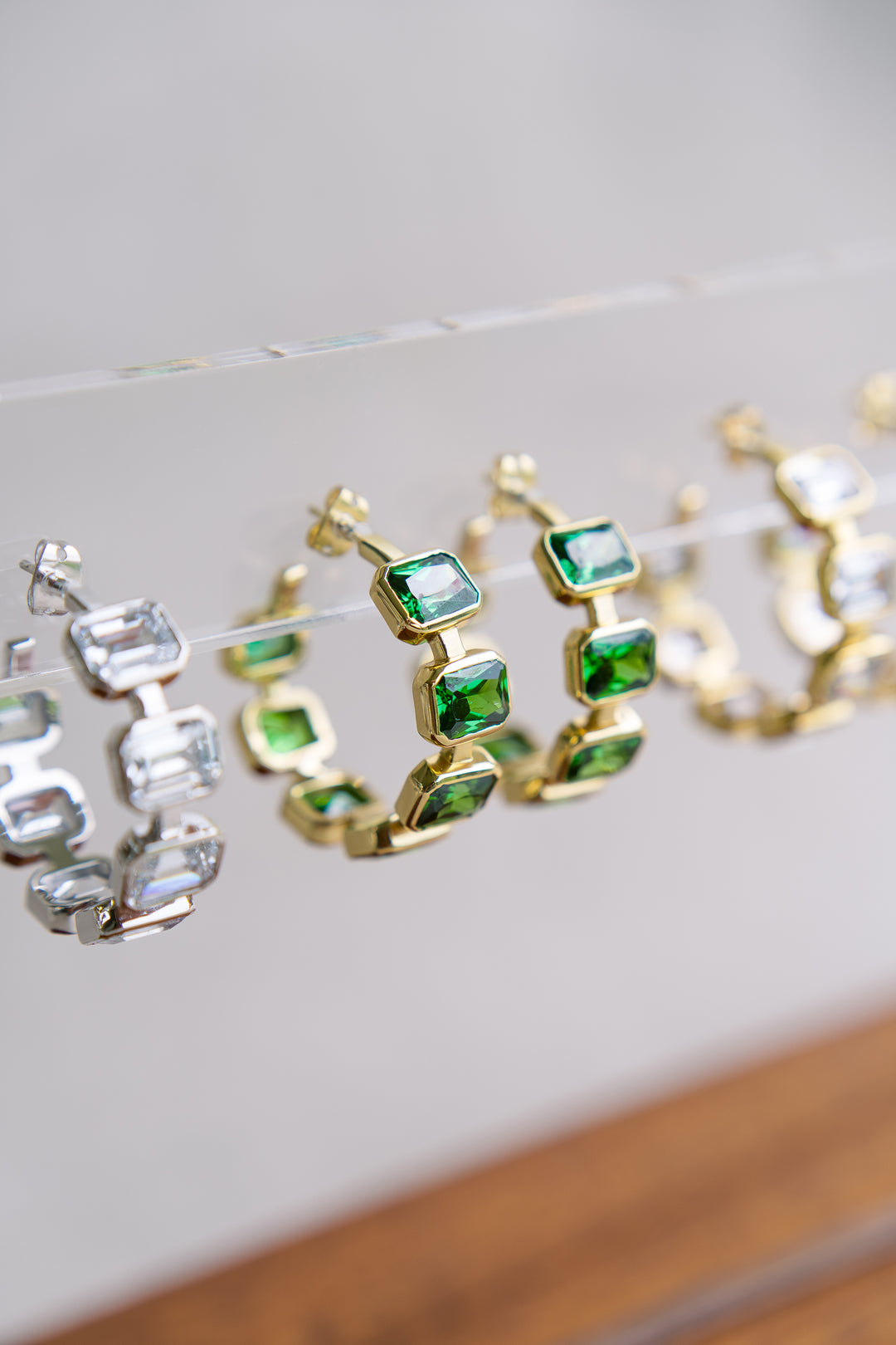 Gesu Hoop Earrings in Emerald Green Cubic Zirconia and Yellow Gold