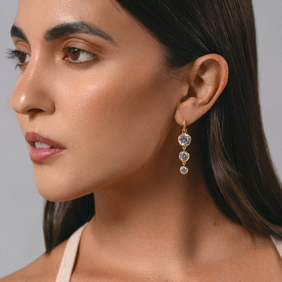 Mini Dropping Circles Huggie Hoop Earrings in Cubic Zirconia