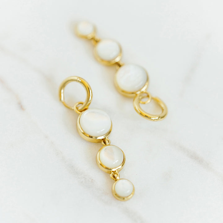 Mini Dropping Circles Huggie Hoop Earrings in Mother of Pearl