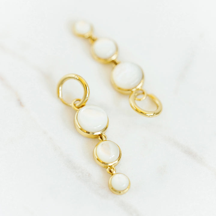 Mini Dropping Circles Huggie Hoop Earrings in Mother of Pearl